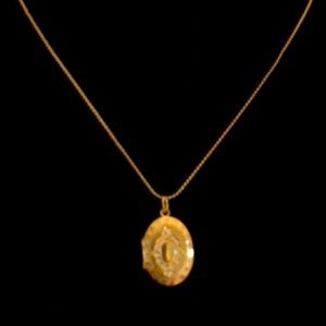 Sweet gold tone locket